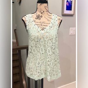 Mint EXPRESS bedazzled with spike tank. Size S floral layerable.